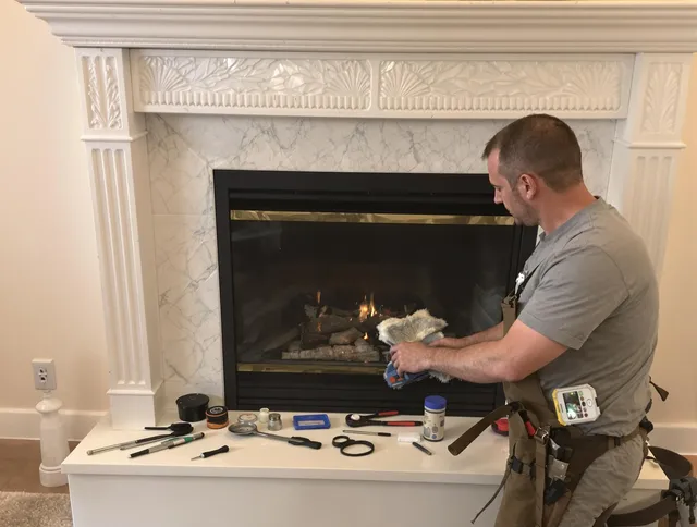 Eastlake Chimney Sweep performing fireplace maintenance in Eastlake, OH